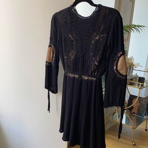 Black mini dress with tan detailing